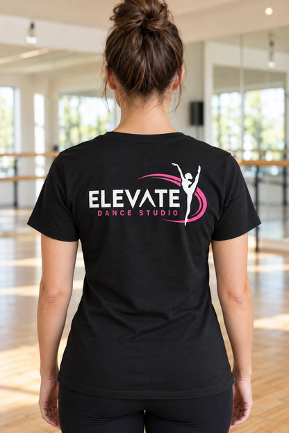 Woman wearing a black dance studio concert t-shirt showing a bold back print
