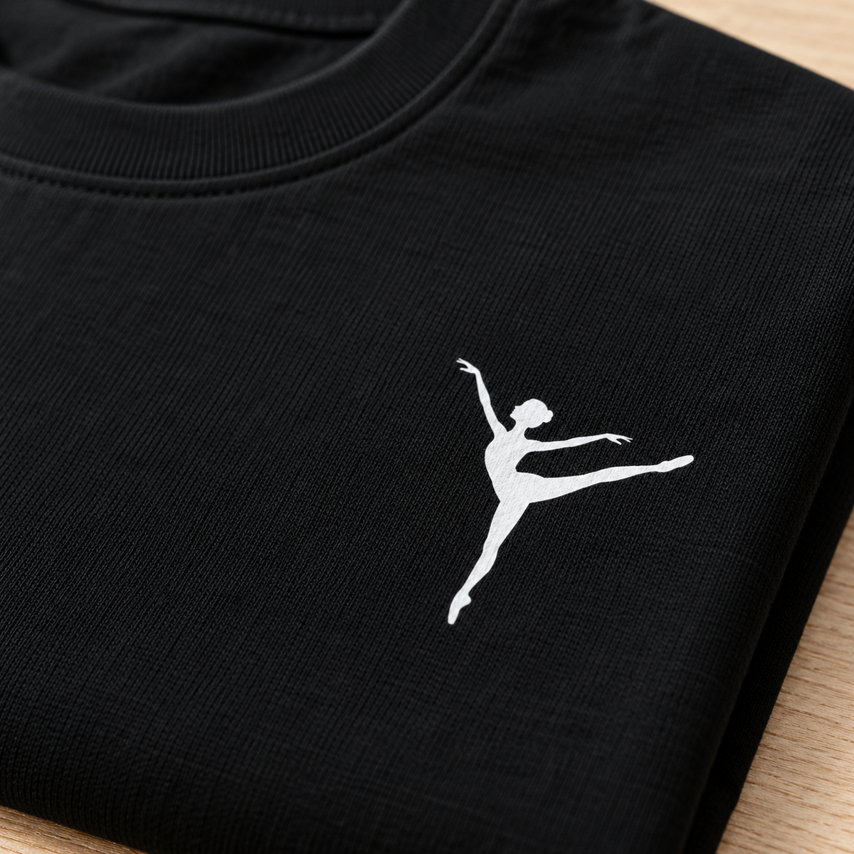 Black dance studio concert t-shirt with a white dancer logo print